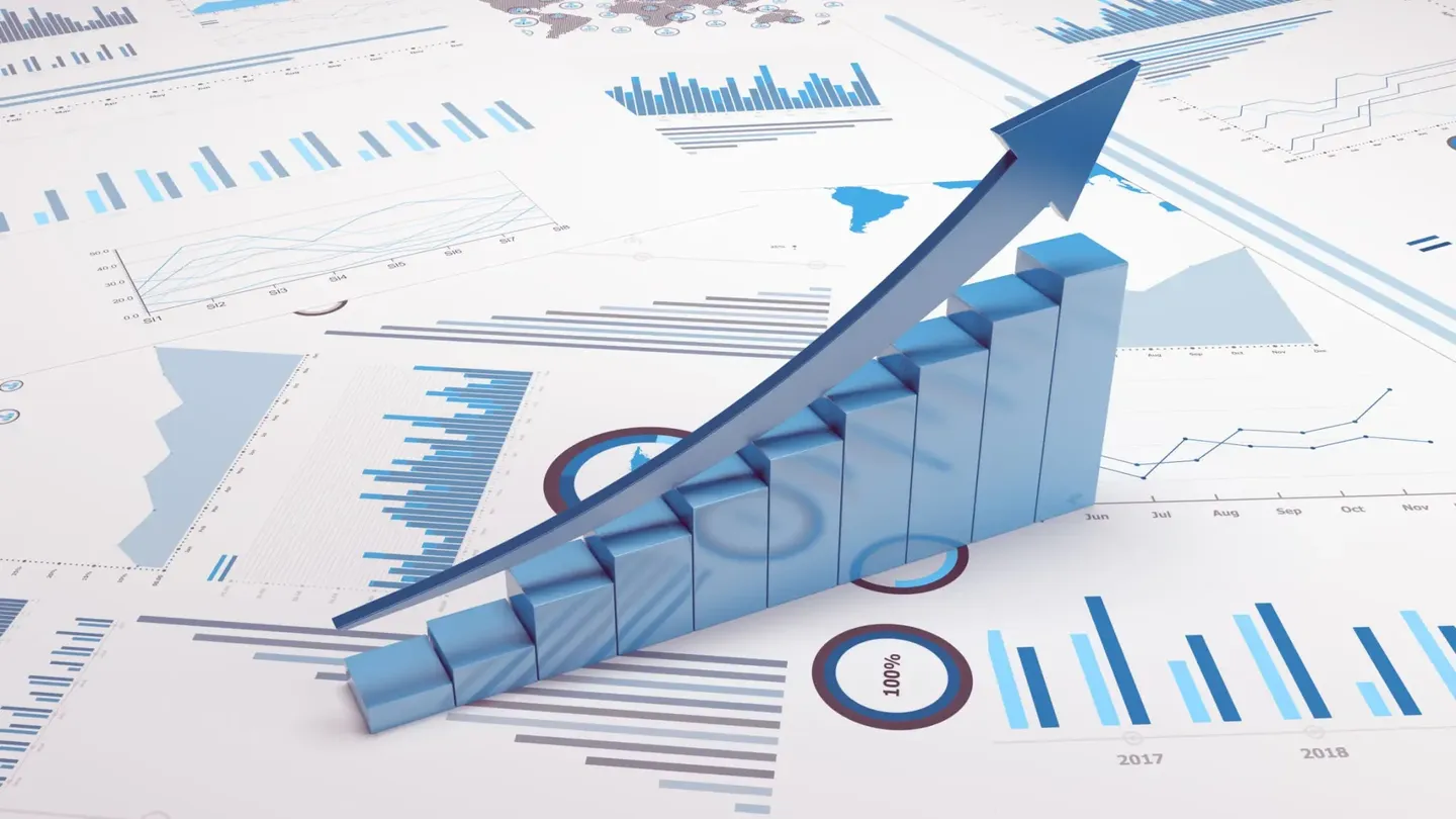 3D blue arrow and bar graph showing business growth on charts.